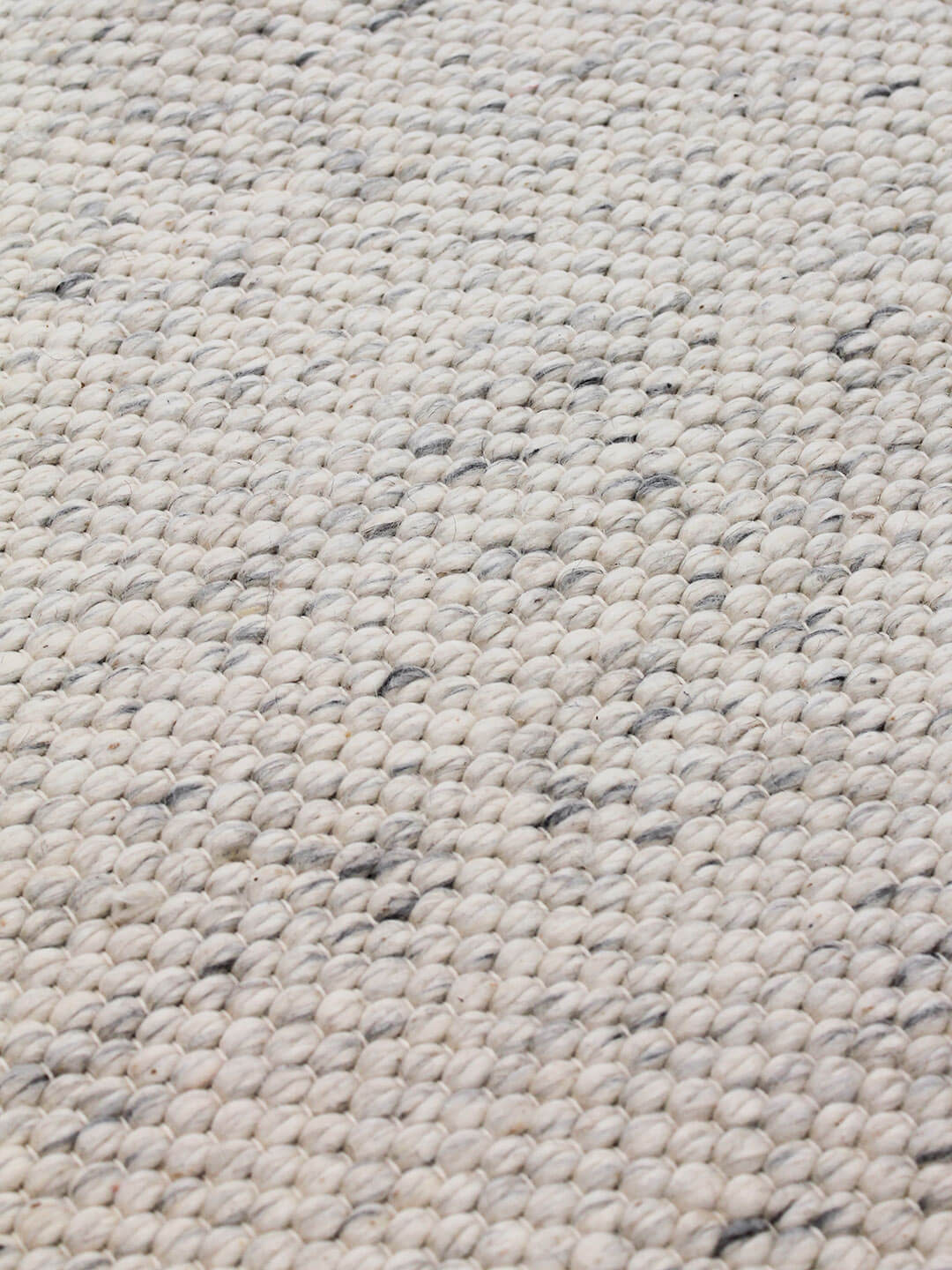 Hunter textured flatweave rug in ivory and white handmade from wool