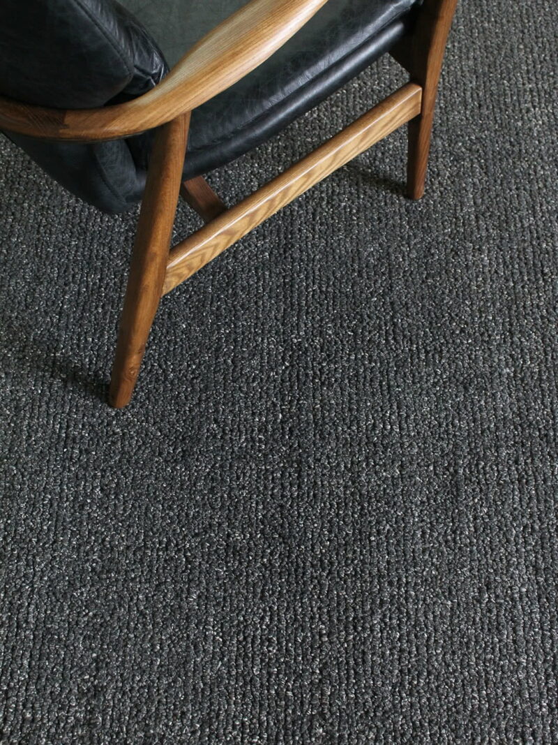 Odyssey loop pile wool rug in charcoal grey texture rug close up