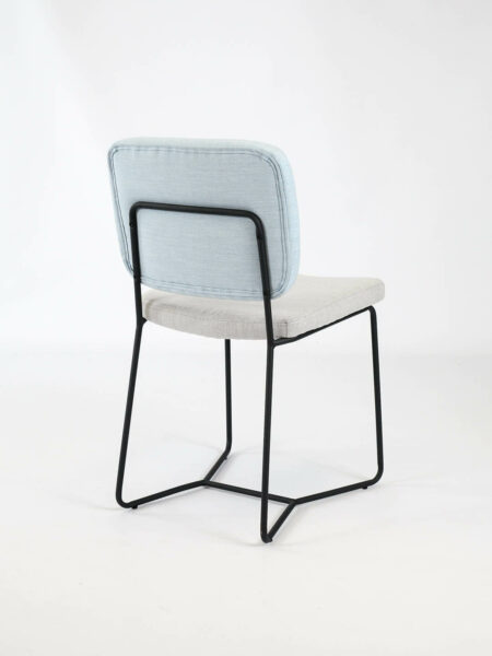 Candy dining chair in two tone fabric with black legs back view