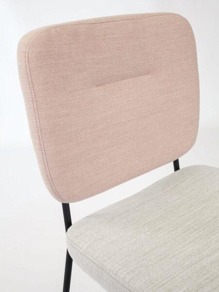 Candy dinign chair in two tone fabric in pink and natural with black legs detail of chair