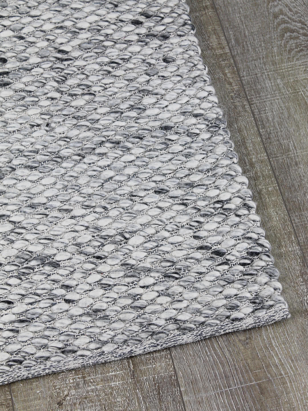 Palmas Smoke handwoven flatweave rug in 100% wool - corner image