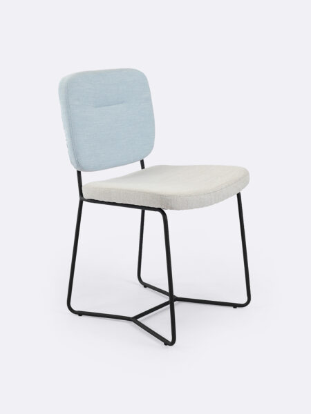 Candy dining chair in two tone fabric with black legs in blue and natural