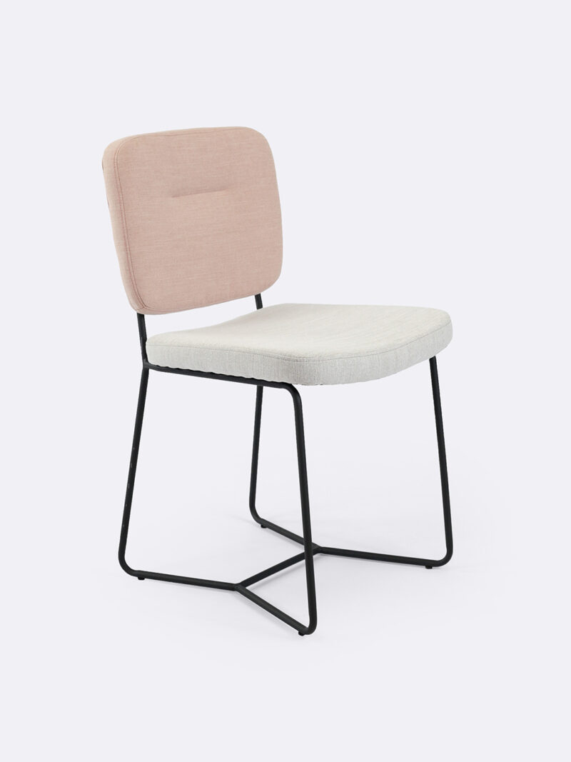 Candy dining chair in two tone fabric in pink and natural with black legs