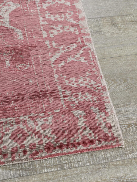 Alcazar flamingo pink rug corner of rug