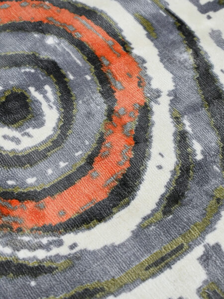Akarley by Charmaine Pwerle - Indigenours rug design in orange, green and grey colours - close up detail