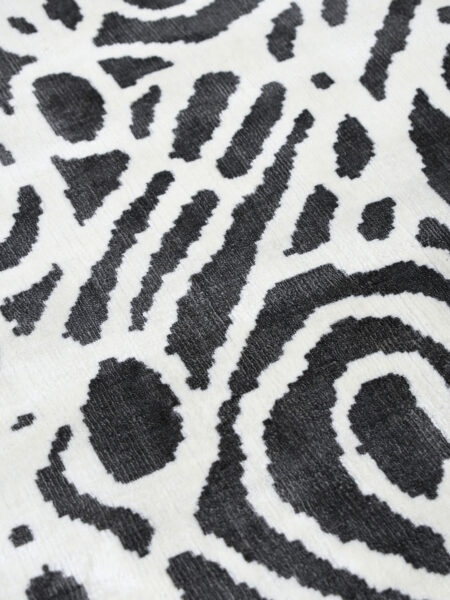 Kwerralya by Charmaine Pwerle - Indigenours rug design with black and white pattern - close up detail