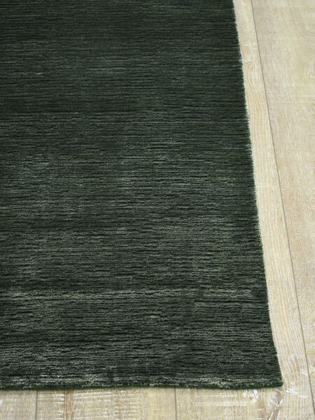 Shimmer Forest dark green rug handmade in wool & artsilk - corner image