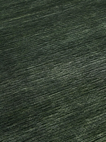 Shimmer Forest dark green rug handmade in wool & artsilk - detail image
