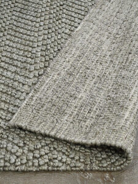 Caspian Taupe textured chevron design rug handwoven in wool and artsilk - back of rug