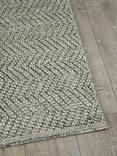 Caspian Taupe textured chevron design rug handwoven in wool and artsilk - corner image