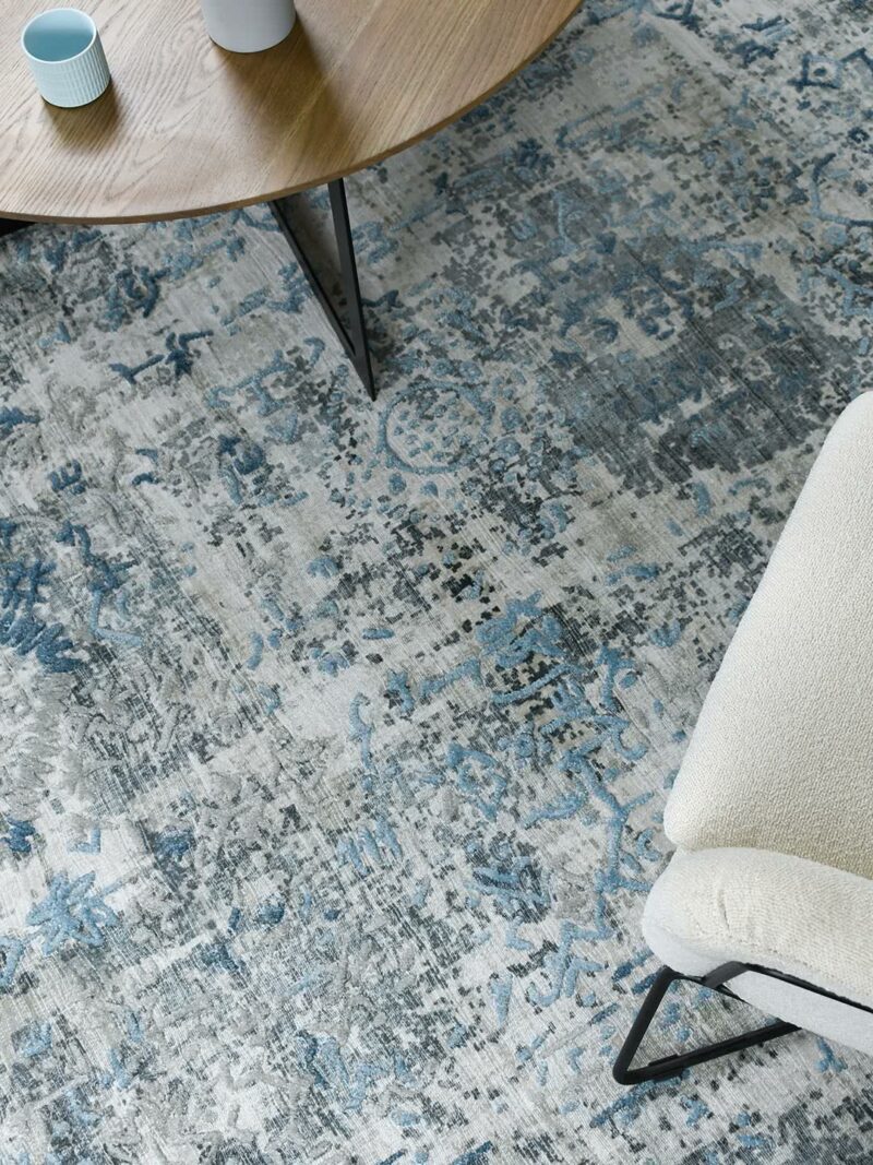 Bastille Silver Blue grey handloom knotted wool & artsilk rug - lifestyle image