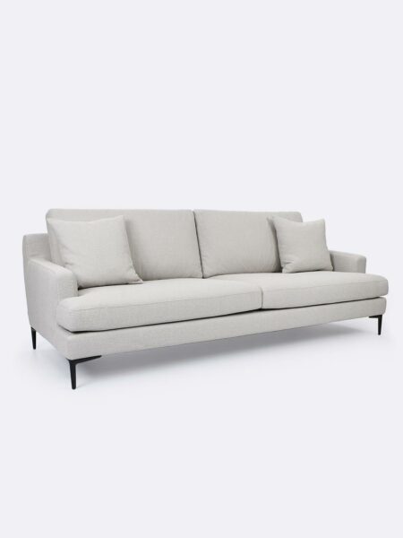 Zane Sofa upholstered in Wheat beige fabric - angle view with cushions