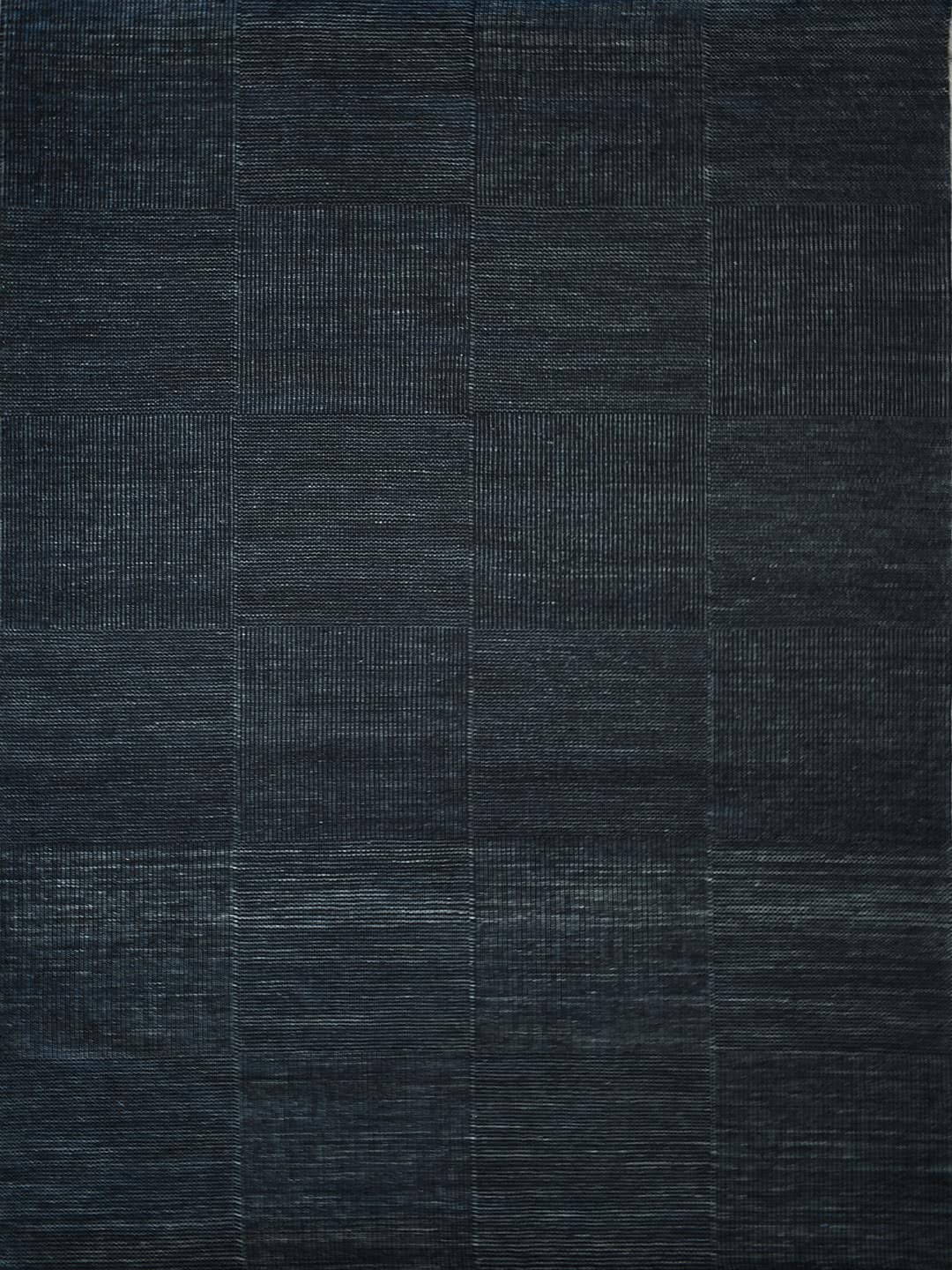 Braid Box Abyss flatweave rug in black and grey, handmade from 100% wool