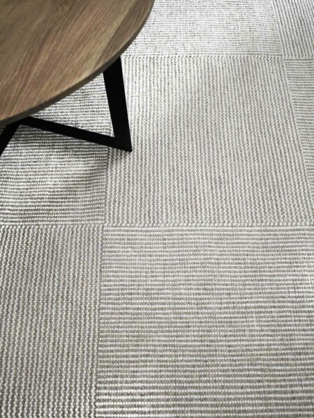 Braid Box Rug flatweave in colour Natural in beige and white, handmade from 100% wool, lifestyle image