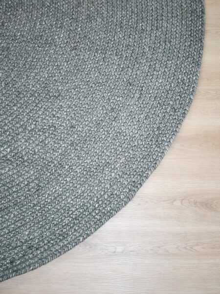 Paddington Breeze blue-grey handwoven plaited round rug handmade in wool and artsilk blend
