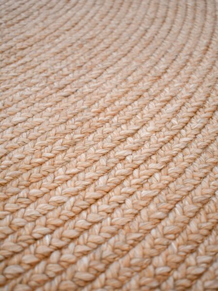 Paddington Clay handwoven plaited round rug handmade in wool and artsilk blend - texture detail