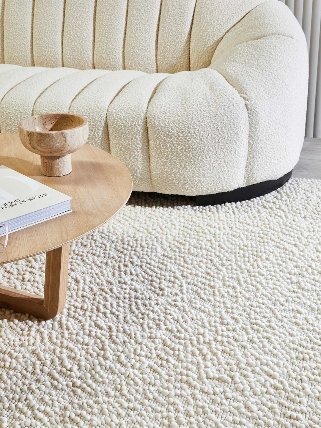 Boucle Ivory wool rug insitu with Lily Boucle Sofa