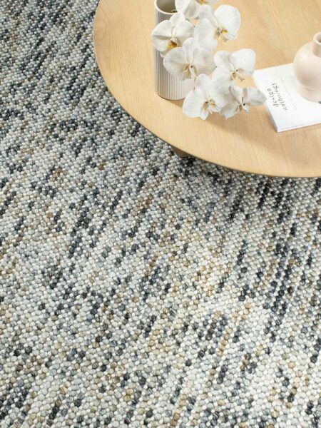 Magic Rug in Mineral grey/mustard yellow. A textured rug handwoven in pure wool. Living Room image.