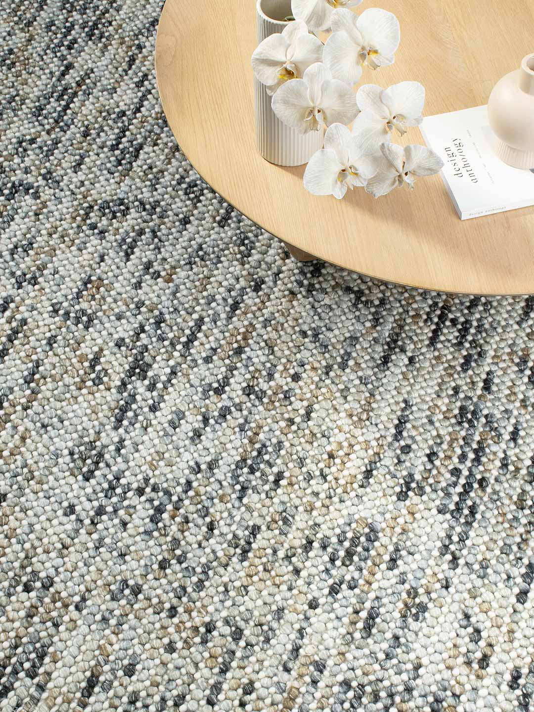 Magic Mineral grey/mustard yellow textured rug handwoven in wool - lifestyle image