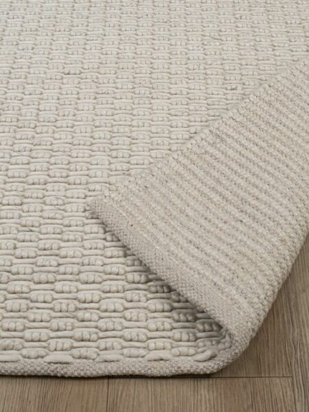Marco Ice Ivory beige The Rug Collection fold