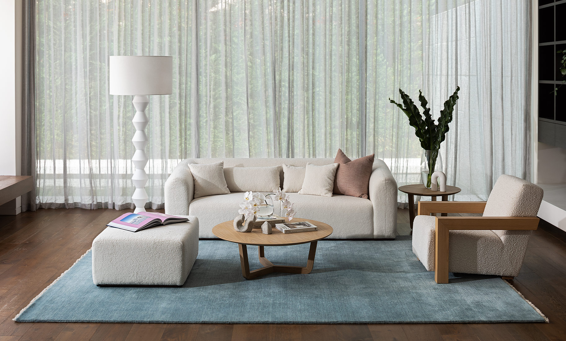 Insitu featuring diva sky blue, Mitchell sofa and ottoman by The Rug Collection