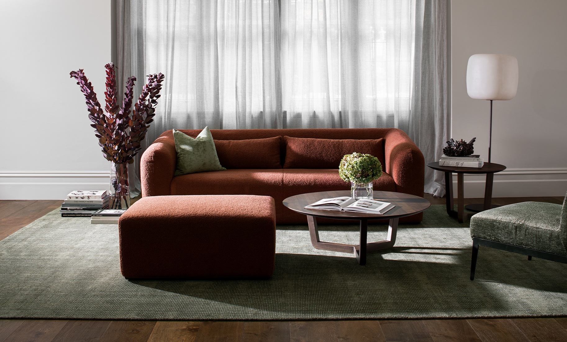 Insitu featuring garcia rug, mitchell sofa and ottoman, theodore table and milton chair by The Rug Collection