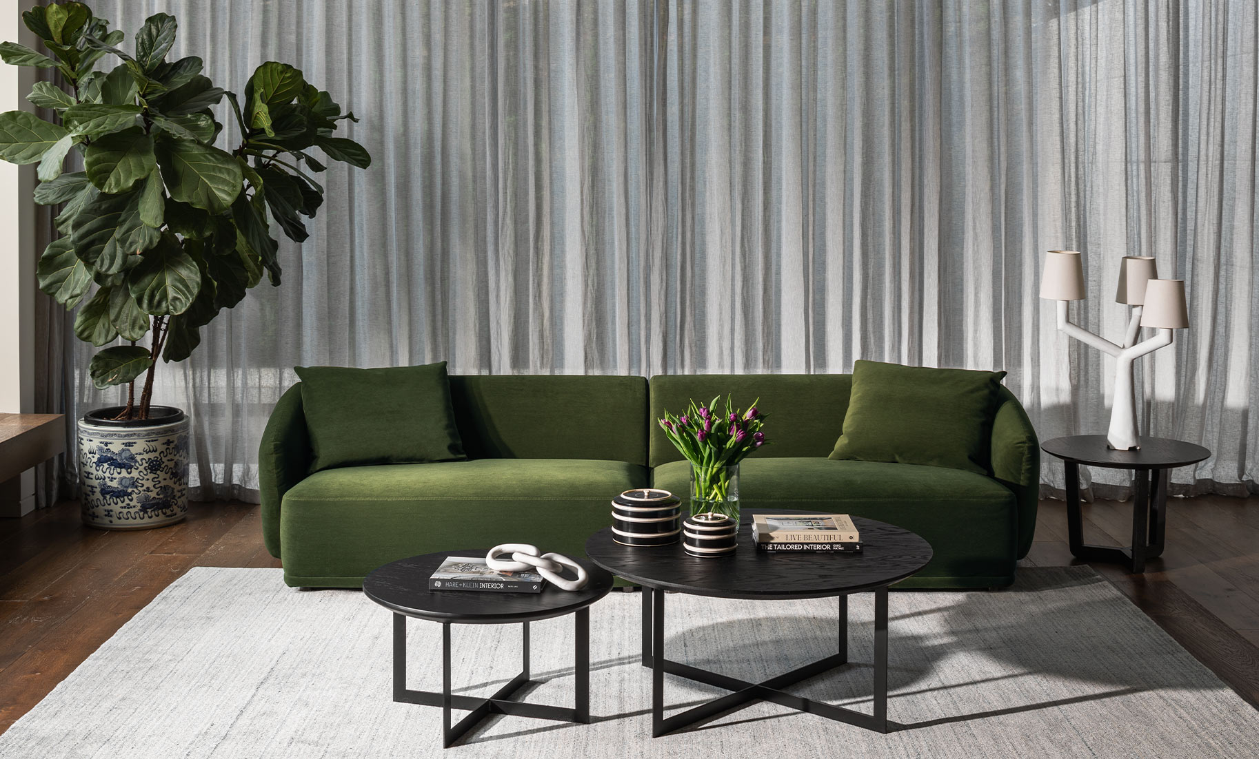 Insitu featuring Gemma Sofa, Harry tables and mystique rug by The Rug Collection