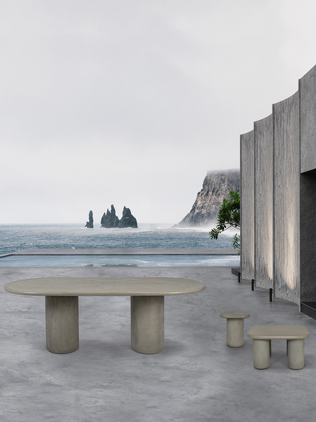 Muundo table collection inspired by nature with Haaki Collection dining table and coffee tables outside with an ocean behind